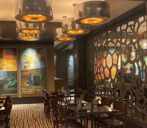 Metal divider wall in restaurant.