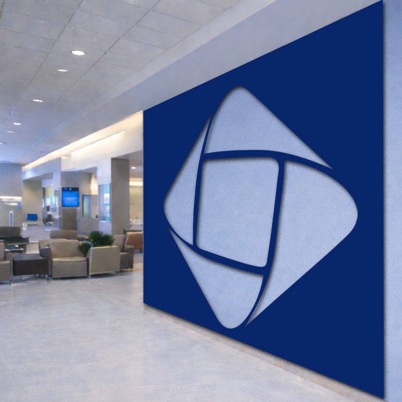 Logo Cut Out Wall Progress Custom metal art logo cutout on lobby wall.